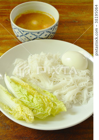 rice noodles and boiled egg with fish curry rice noodles and boiled egg with fish curry 38195064