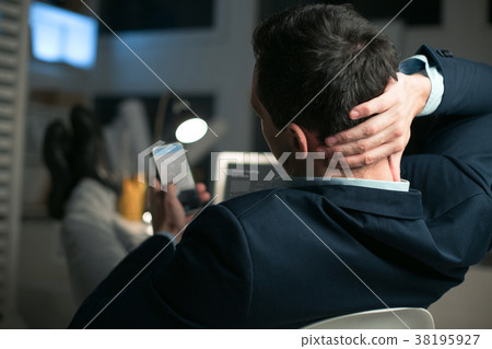 Worried real estate agent worrying about market Worried real estate agent worrying about market 38195927