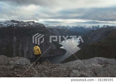 Alone tourist on Trolltunga rock 38196595
