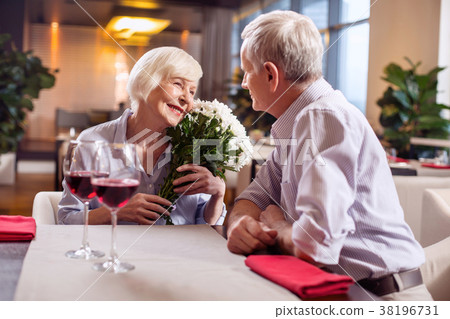 Merry mature couple demonstrating love 38196731