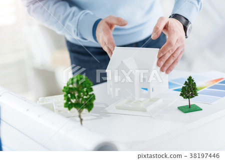 Professional architect working on his project Professional architect working on his project 38197446