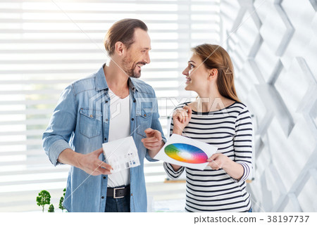 Inspired architects looking at each other 38197737