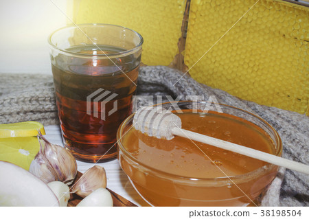 Honey and lemon.  38198504