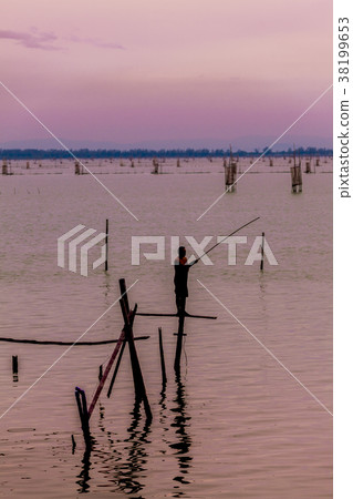 Silhouettes of the traditional fishermen Silhouettes of the traditional fishermen 38199653