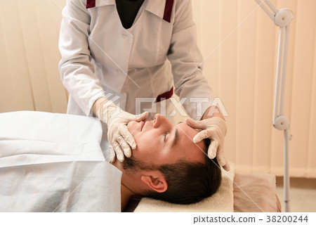 Patient prepare for surgery or treatment in beauty clinic Patient prepare for surgery or treatment in beauty clinic 38200244