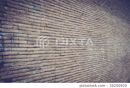 Old brick wall texture in a vintage background Old brick wall texture in a vintage background 38200920