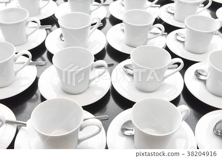 Group of ceramic white cup serving tea or coffee. Group of ceramic white cup serving tea or coffee. 38204916