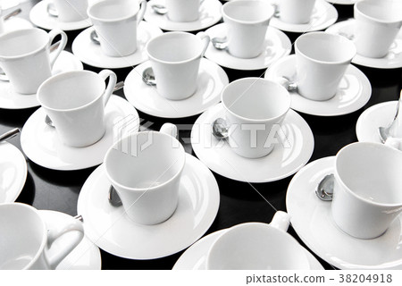 Group of ceramic white cup serving tea or coffee. 38204918