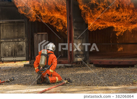 Firefighters fighting a fire,Firefighter training 38206864