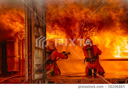 Firefighters fighting a fire,Firefighter training  38206865