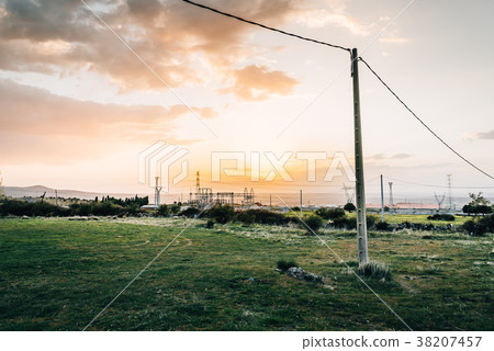 Electrical Power Lines at sunset Electrical Power Lines at sunset 38207457