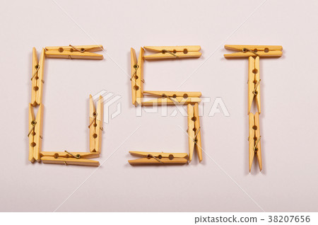 GST letters formed with clothespins 38207656