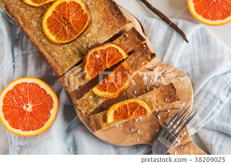 Healthy homemade orange cake with coconut 38209025