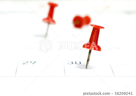 Embroidered red pins on a calendar on the 30th Embroidered red pins on a calendar on the 30th 38209241
