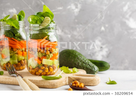 Homemade green salad in a glass jar  38209654