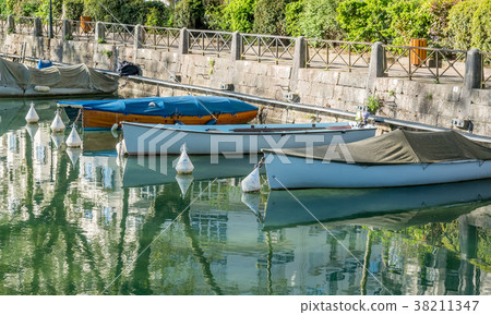 Boats dock at pier in Annecy, France Boats dock at pier in Annecy, France 38211347