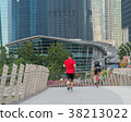 Runners and cyclists exercise in the morning 38213022