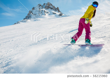 Picture of athlete snowboarding on snow slope Picture of athlete snowboarding on snow slope 38215960