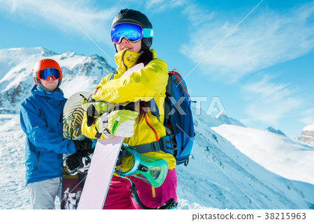 Image of sportive man and woman with snowboard 38215963