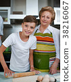 Grandmother with grandchild baking cookies prepare 38216067