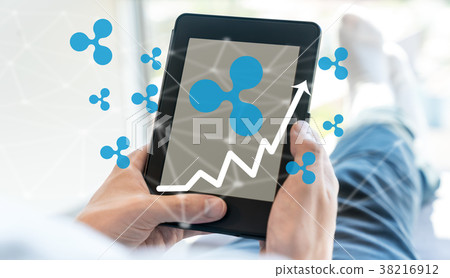 Ripple with man using tablet 38216912