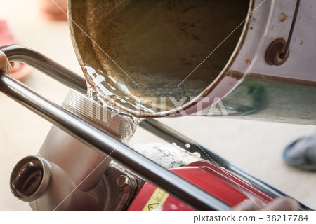 Farmer fill water into self-priming water pump Farmer fill water into self-priming water pump 38217784
