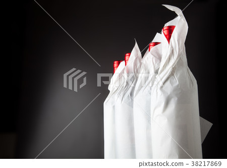 Four bottles on black 38217869