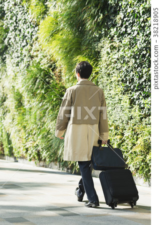 Portrait of a businessman on a business trip 38218905