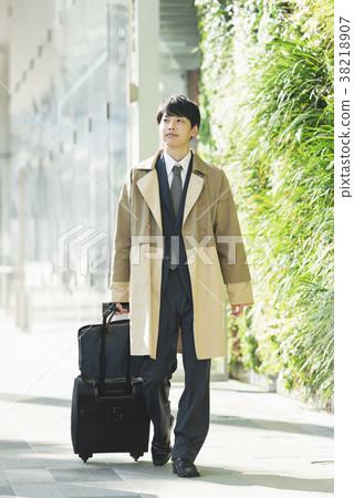 Portrait of a businessman on a business trip 38218907