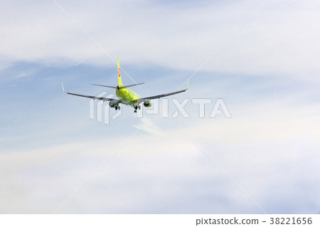 Airplane flies against a background of white cloud Airplane flies against a background of white cloud 38221656