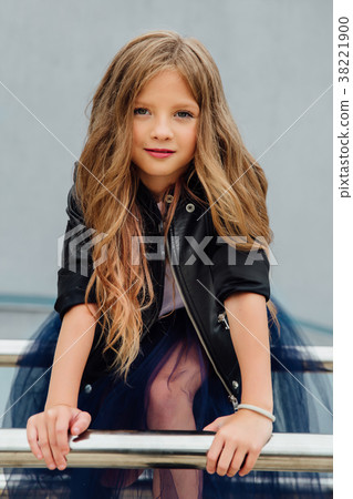 Urban fashion portrait of a teenage girl in the Urban fashion portrait of a teenage girl in the 38221900