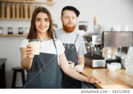 Coffee Business Concept - Positive young bearded 38232808