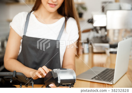 Coffee Business Concept - Beautiful female barista Coffee Business Concept - Beautiful female barista 38232828