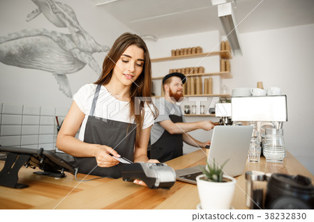 Coffee Business Concept - Beautiful female barista Coffee Business Concept - Beautiful female barista 38232830