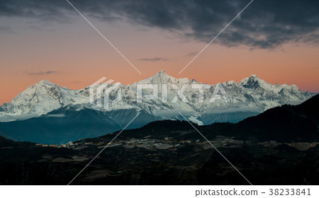 The peak of the Meili mountains at sunrise 38233841