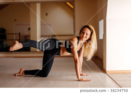 woman doing plank exercise with legs. concept 38234750