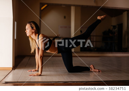 woman doing plank exercise with legs. concept 38234751