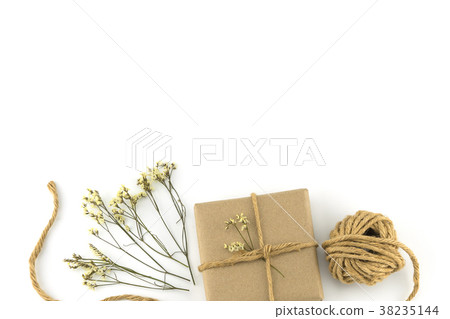 Brown gift boxes, rope with yellow caspia flower 38235144