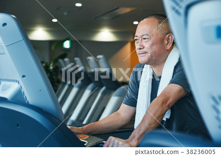 Gym running machine senior man 38236005