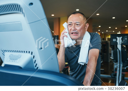 Gym running machine senior man 38236007