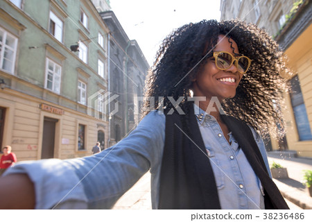 Beautiful black woman wearing casual clothes and Beautiful black woman wearing casual clothes and 38236486