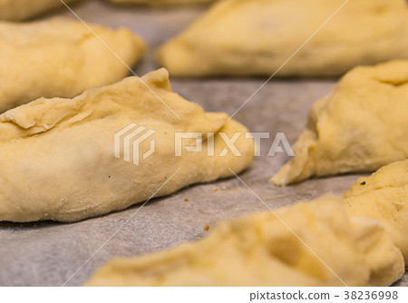 raw pie billet thin dough with minced meat 38236998