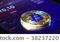 Golden bitcoins on the background of a graphic 38237220