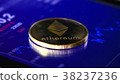Gold coins of the ethereum on the background of a 38237236