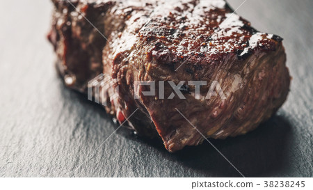 beef steak from entrecote part on slate board 38238245