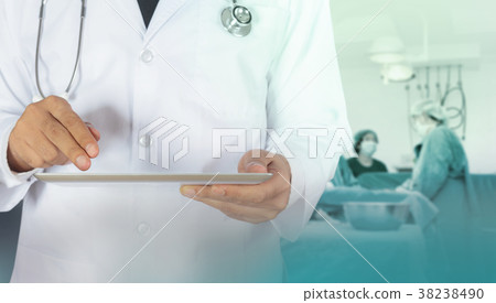 Doctor using a digital tablet Doctor using a digital tablet 38238490