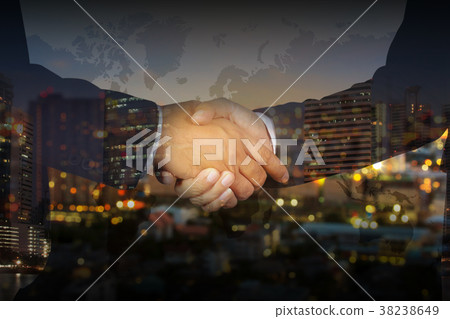 Double exposure of Businessman handshake Double exposure of Businessman handshake 38238649