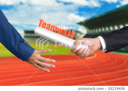 Businessman passing relay baton to colleague 38239486