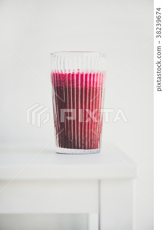 Fresh detox beetroot smoothie in glass, white Fresh detox beetroot smoothie in glass, white 38239674