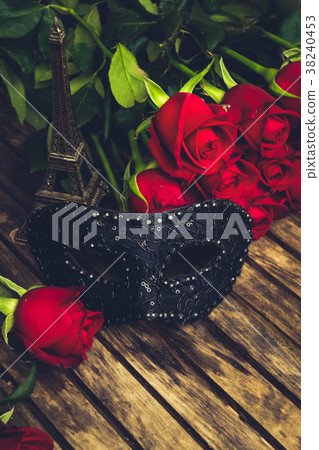 dark red roses on table 38240453